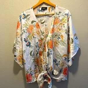 Deep v neck blouse with floral pattern